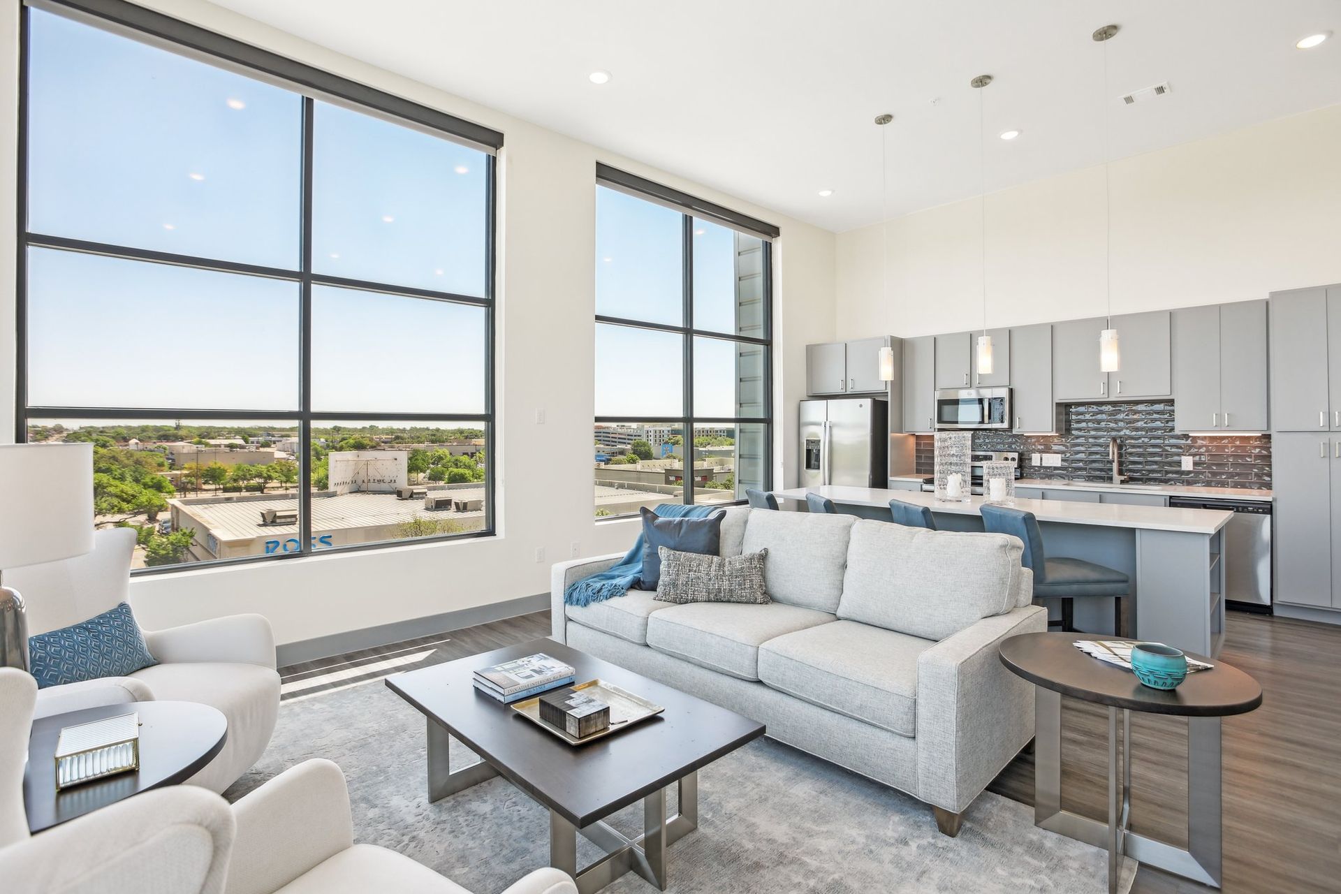 A large living area with large windows