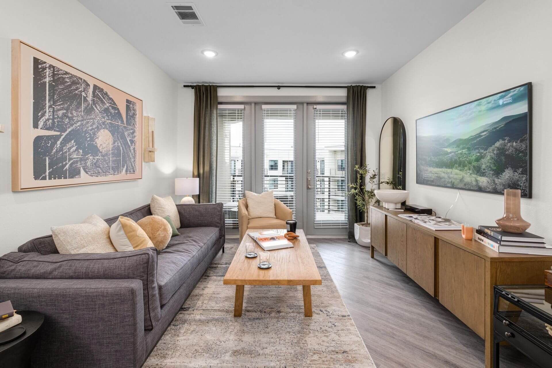 A living room with a couch and a table