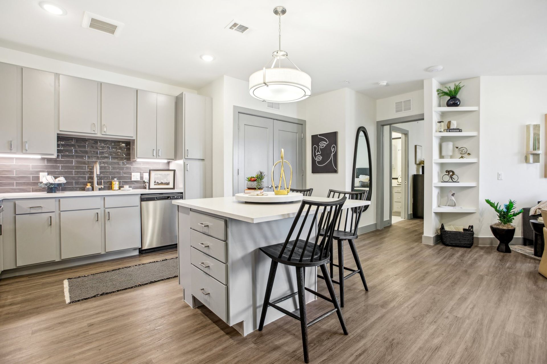 kitchen with gray cabinets and a island