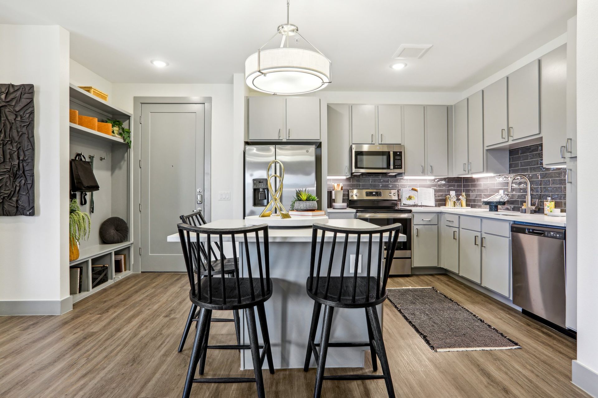 kitchen with bar stools and stainless steel appliances
