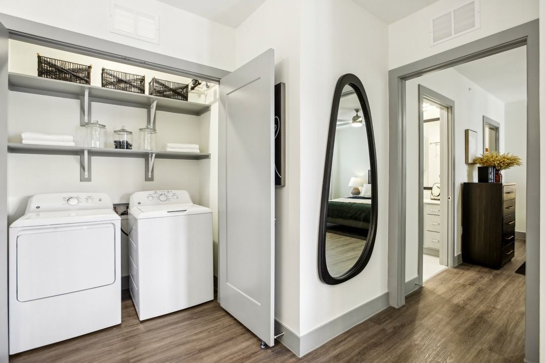 Full size washer and dryer with additional storage