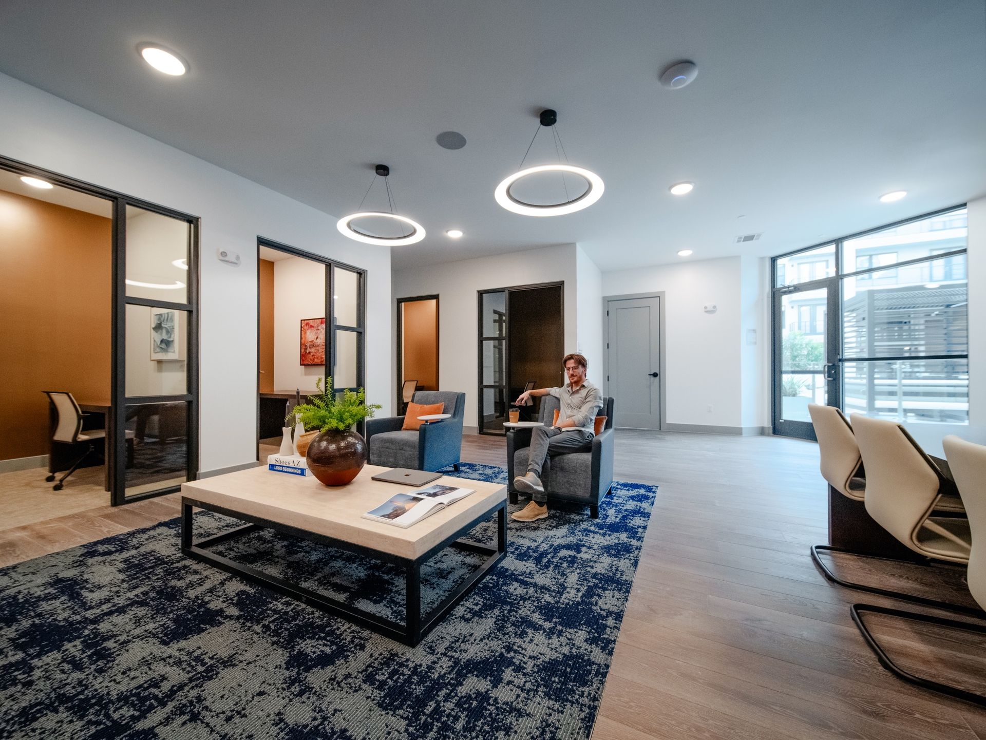 co-working space with man sitting in chair