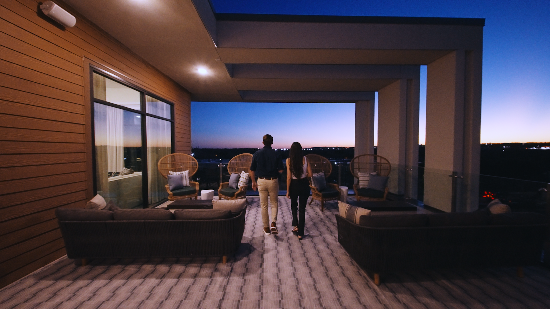 Sky lounge with views of downtown at sunset