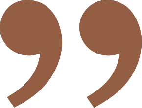 A pair of brown commas on a white background