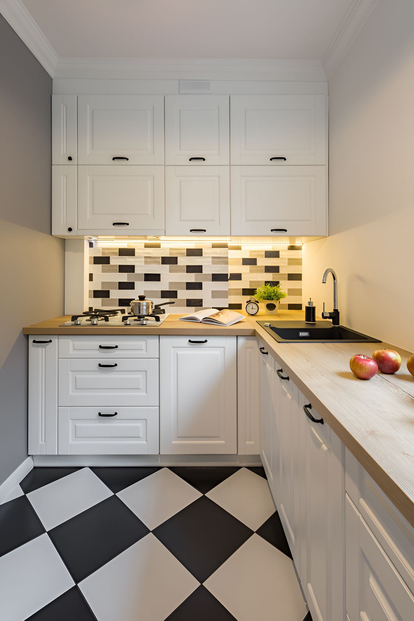 A Kitchen With White Cabinets and a Black and White Checkered Floor — Foreshore Kitchens In Caloundra, QLD