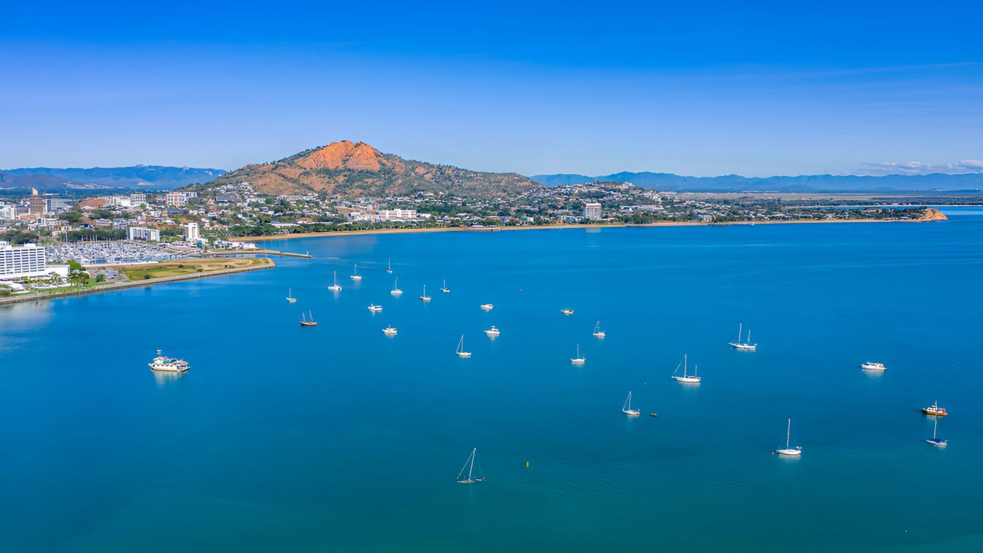 An aerial view of a large body of water with boats in it — Foreshore Kitchens In Twin Waters, QLD