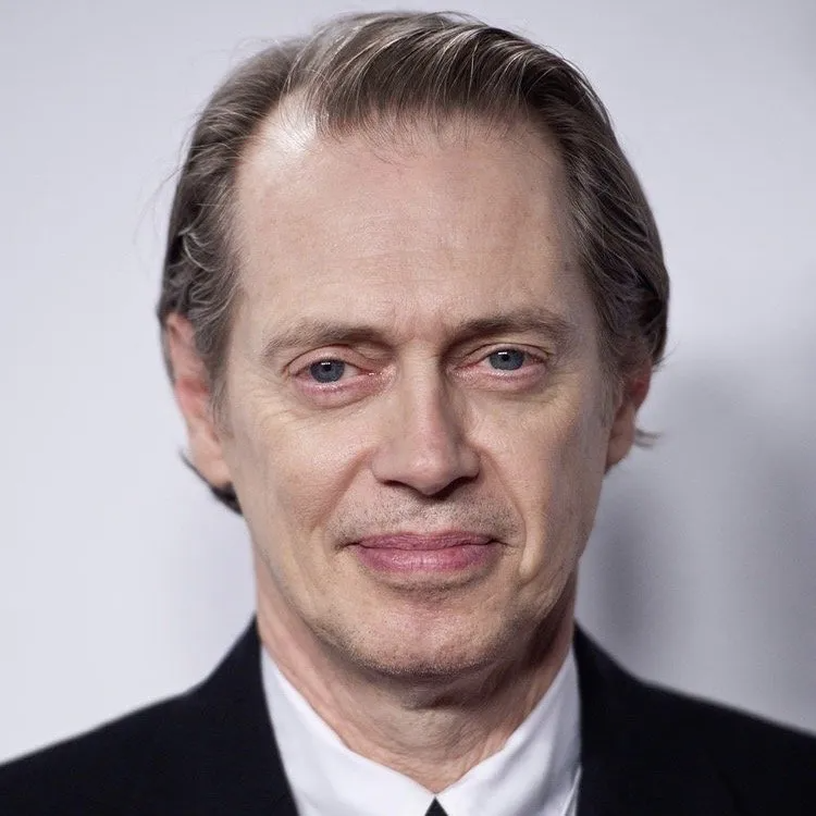 Steve Buscemi looking forward with a neutral expression against a plain light background.