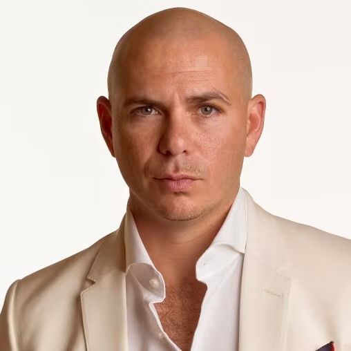 A close-up portrait of a bald person wearing a white dress shirt and a cream blazer, looking forward with a neutral gaze.