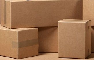 Cardboard boxes stacked together.