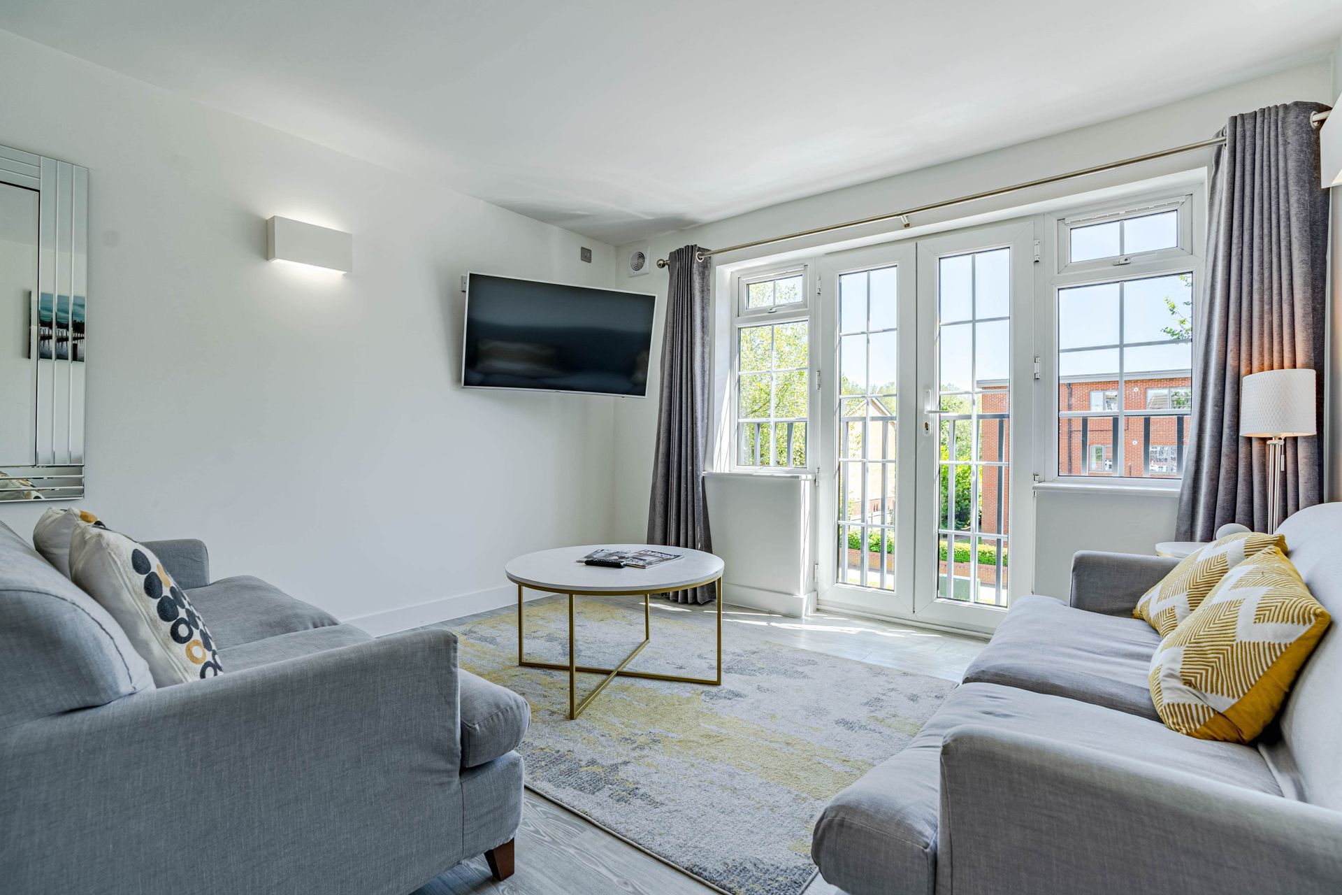Faculty open plan living area with large windows Celador apartments