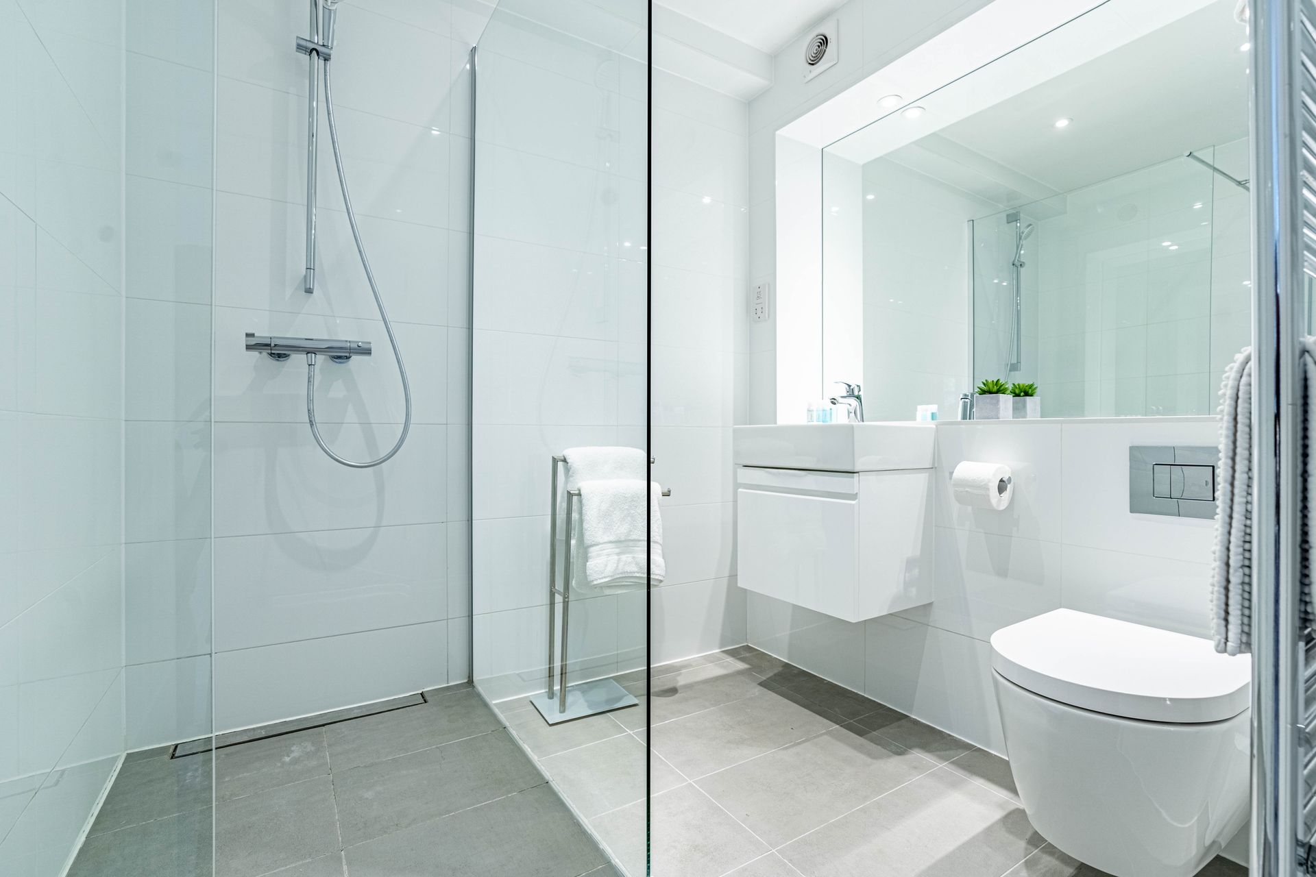 faculty bathroom with walk in shower celador apartments