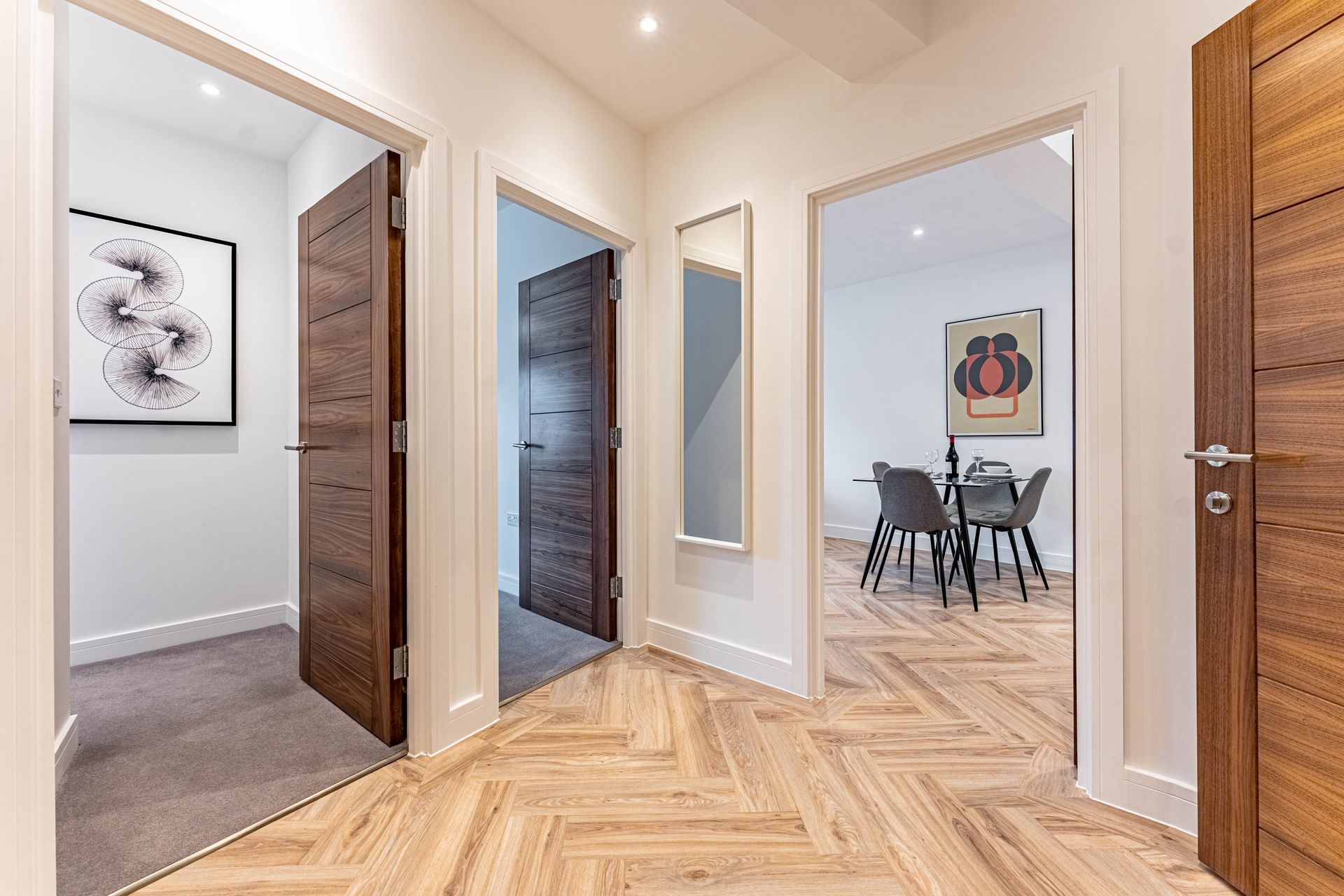 Wellington house hallway with open doors leading to the dining room and bedroom