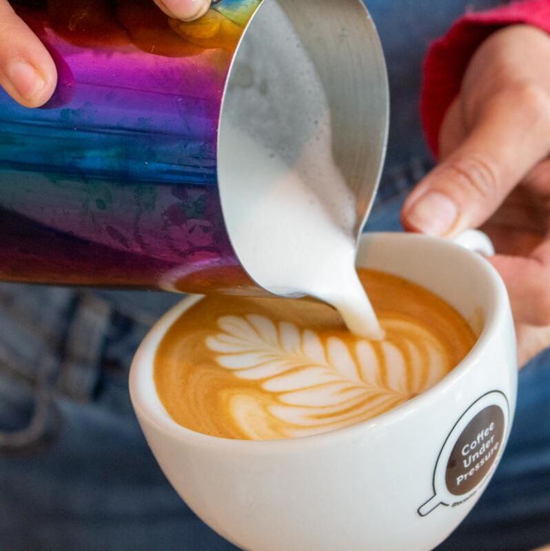 Coffee pouring into cup at Coffee under pressure, Reading