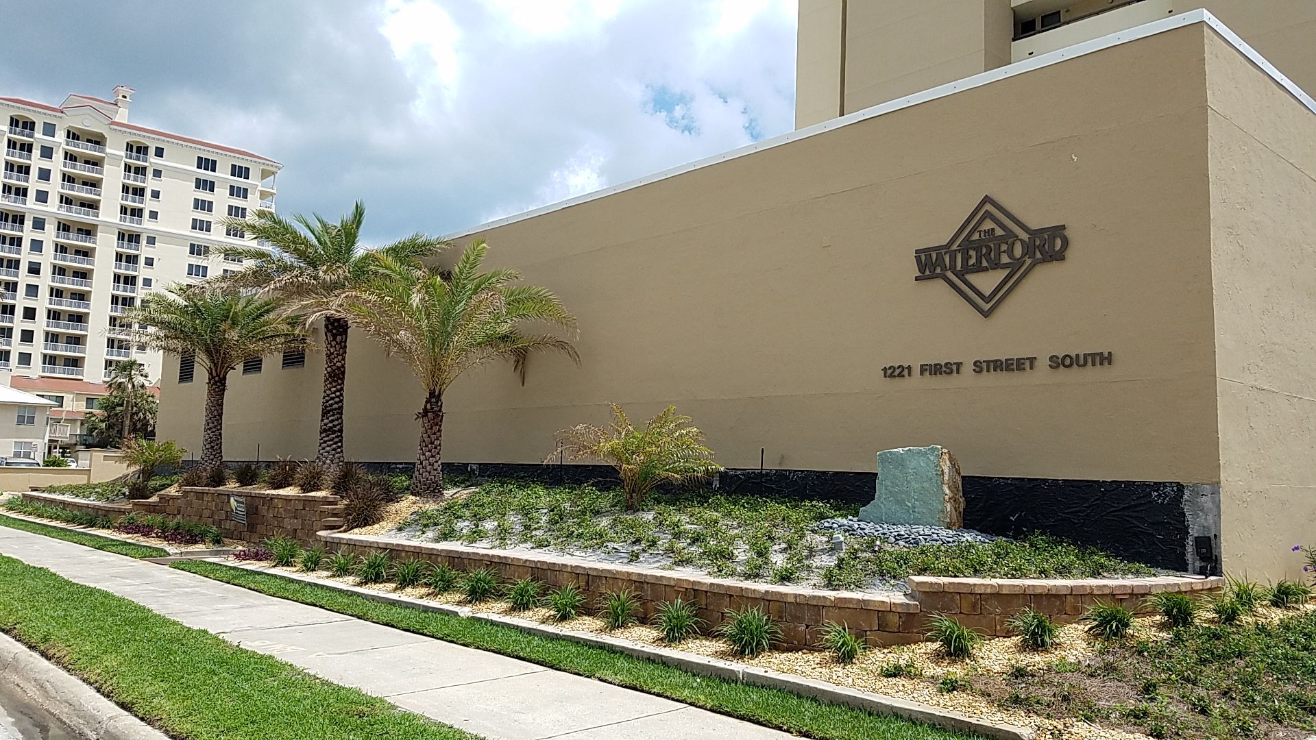 A large building with a sign on the side of it.