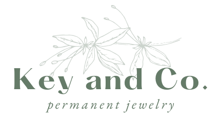 Key and Co. logo: green text with floral illustration; "permanent jewelry" below.