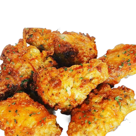 A pile of fried chicken wings on a white background