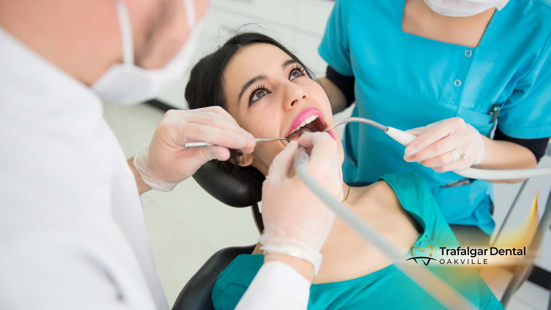 Woman in dentist chair having dental work performed.