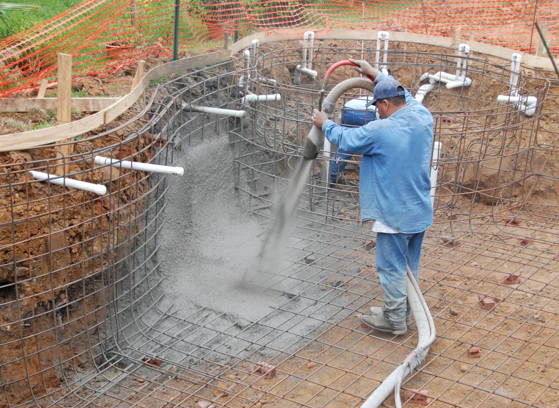 Builder Sprays Gunite for a Suburban Pool — Chicagoland, IL — Welsch Ready Mix, Inc.
