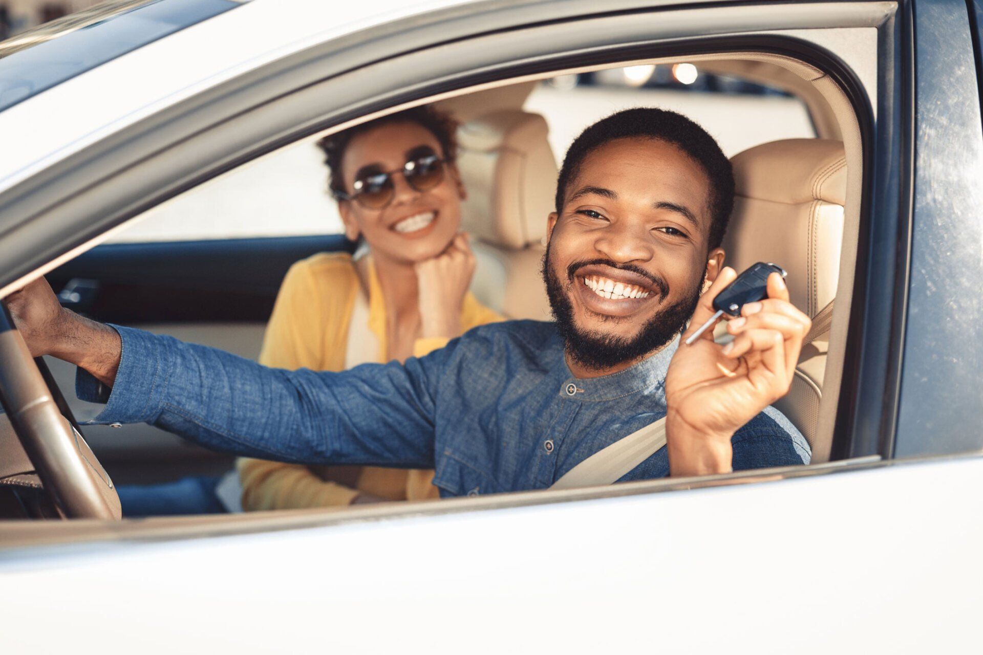 Happy Couple in a Car — Oakwood, GA — Ace Lock & Safe Security