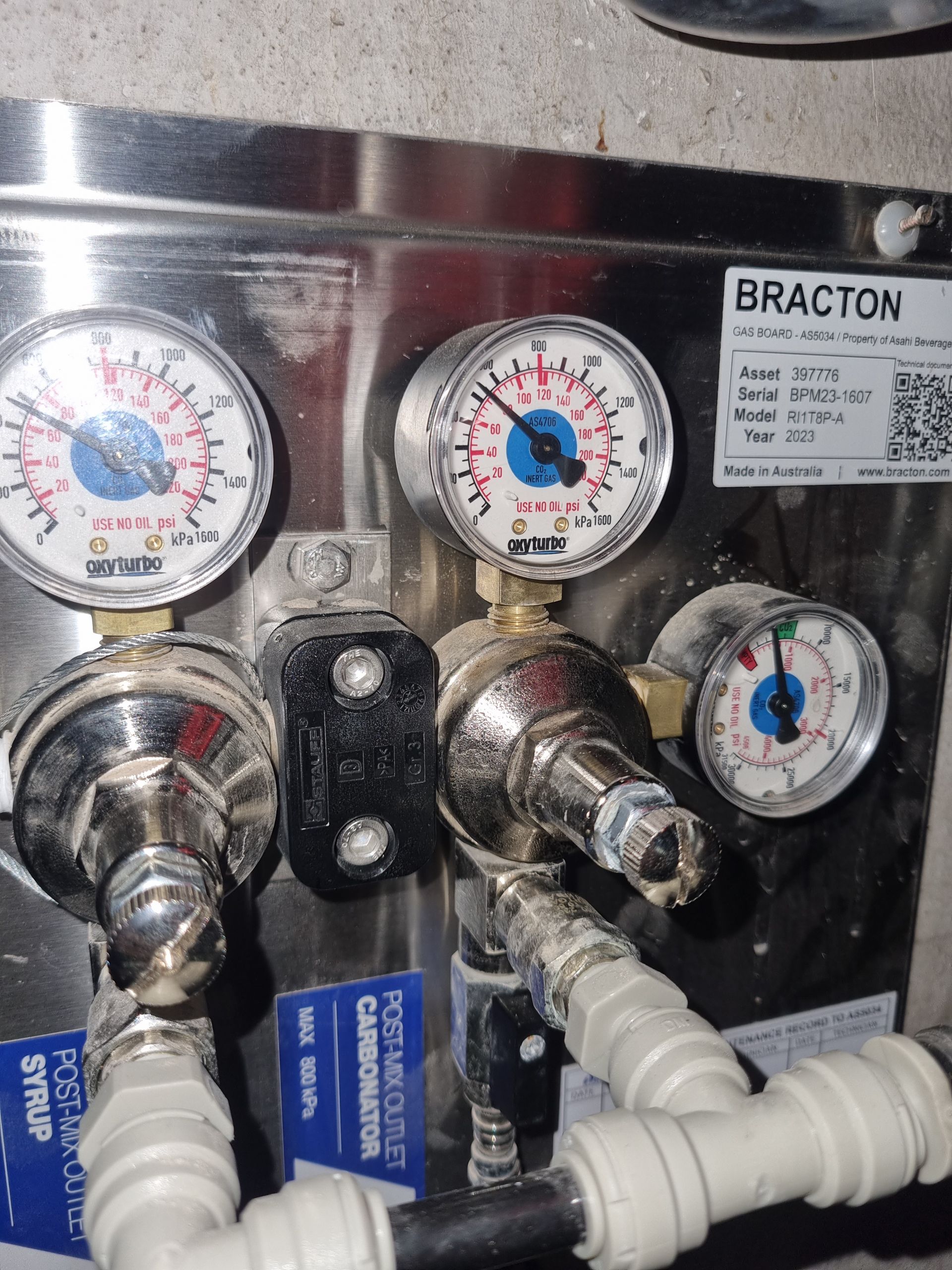 A stainless steel box with braxton written on it