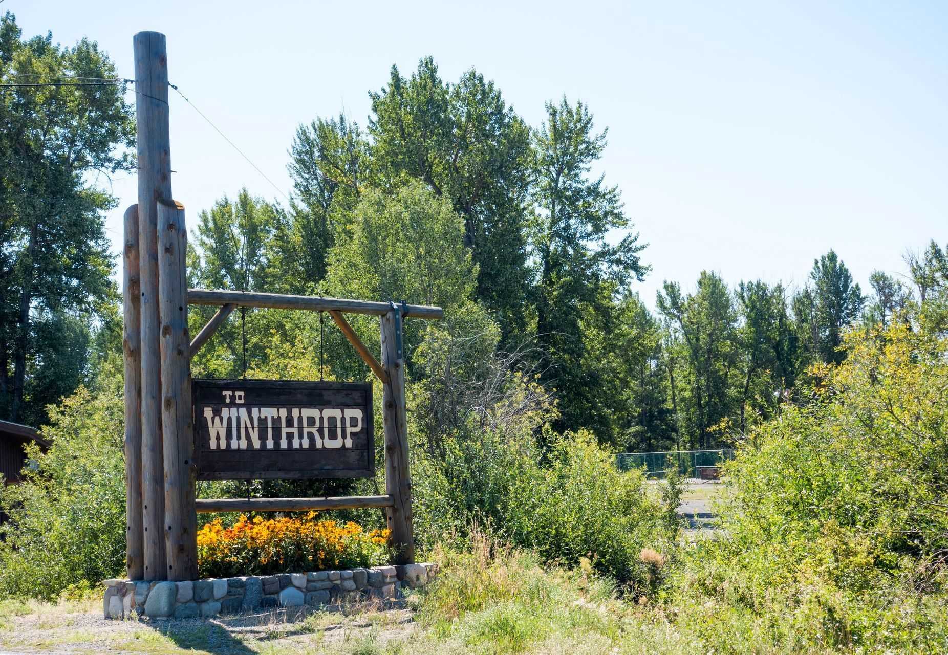 A wooden sign that says winthrop on it