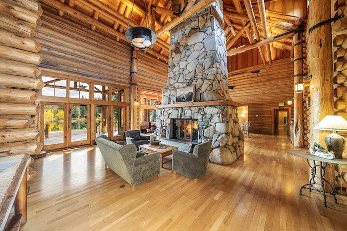 There is a large fireplace in the middle of the room.