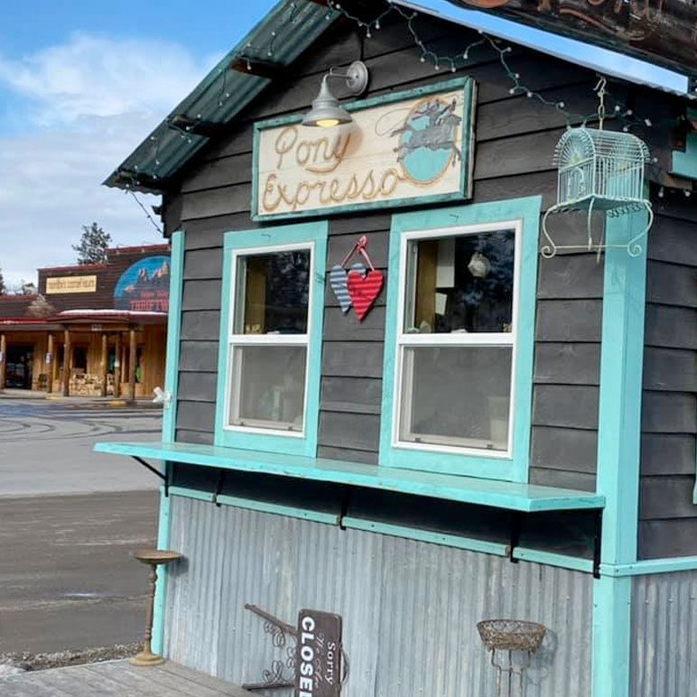 A small building with a sign that says pony express