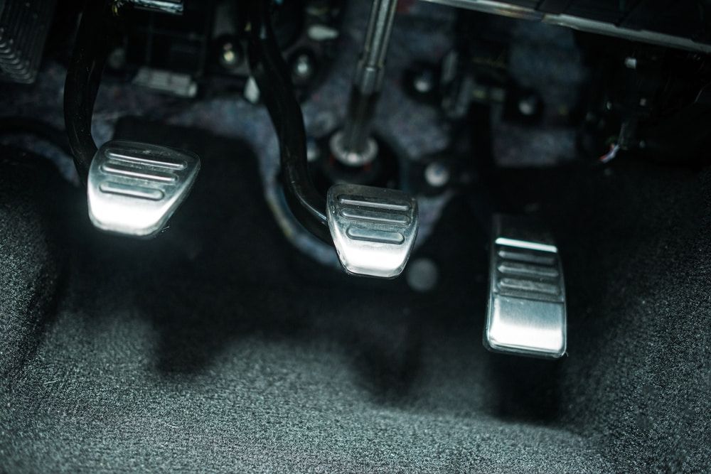 A Close up Of the Brake Pedals of A Car — FCE Mechanical & Air Conditioning in Berrimah, NT