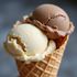 Two scoops of ice cream (chocolate, vanilla) in a waffle cone.