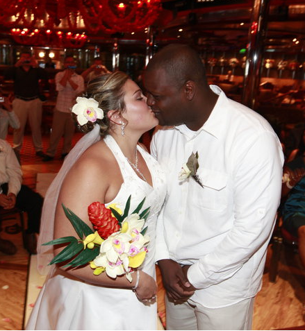 A bride and groom kissing on their wedding day