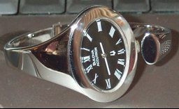 Accutron 230 ladies bangle watch after refinishing and rhodium plating at the time preserve
