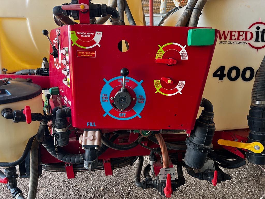 A weed killer 400 is sitting on the ground