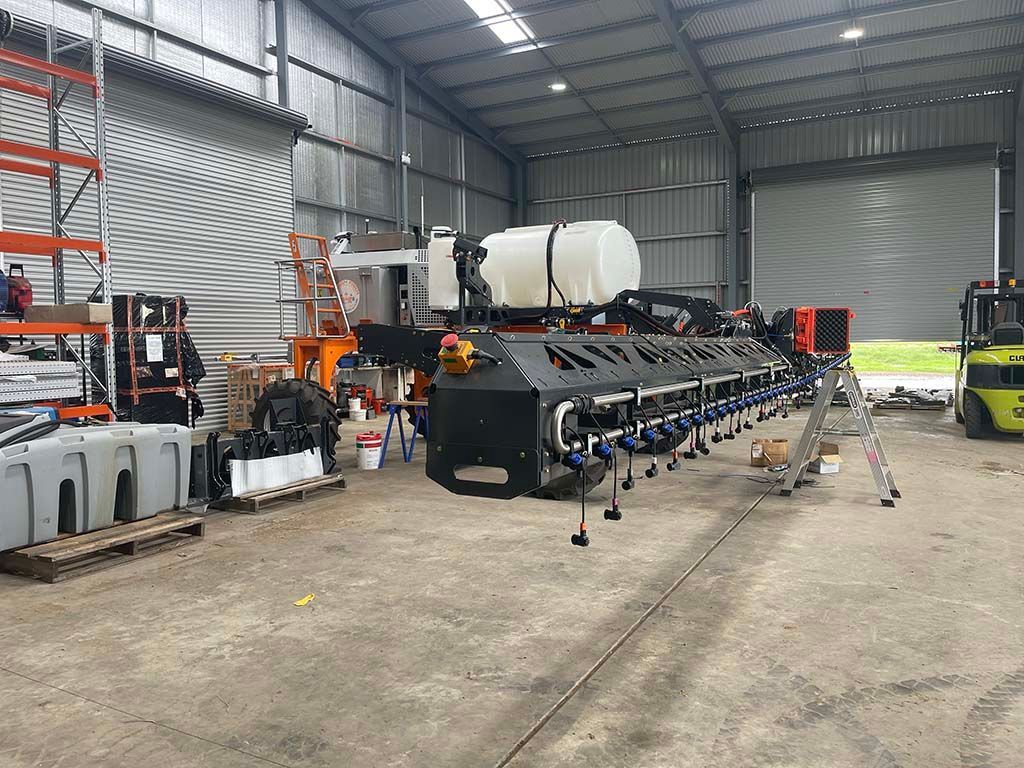 A large warehouse filled with lots of machinery and equipment.