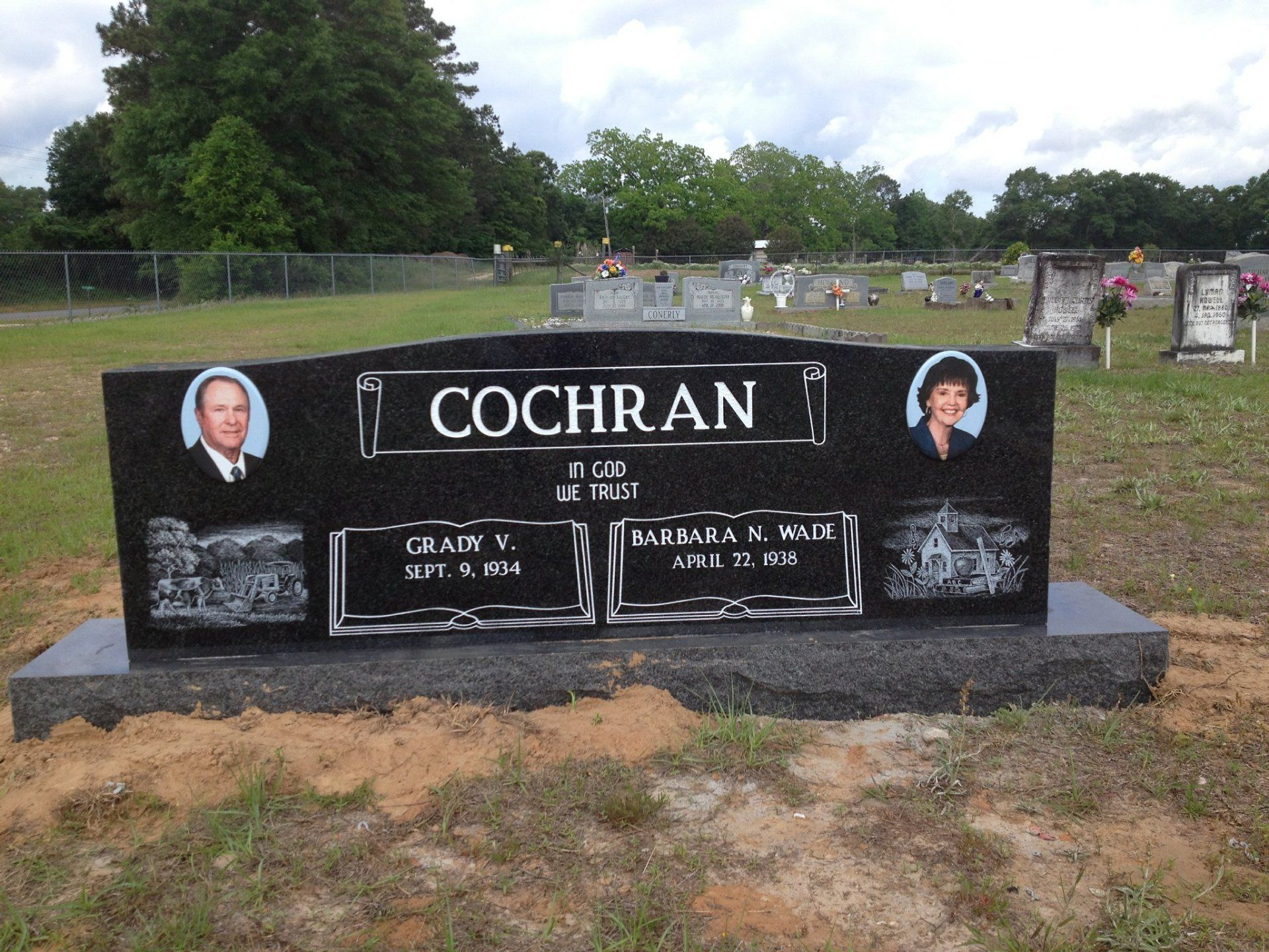 A black gravestone with the name cochran on it