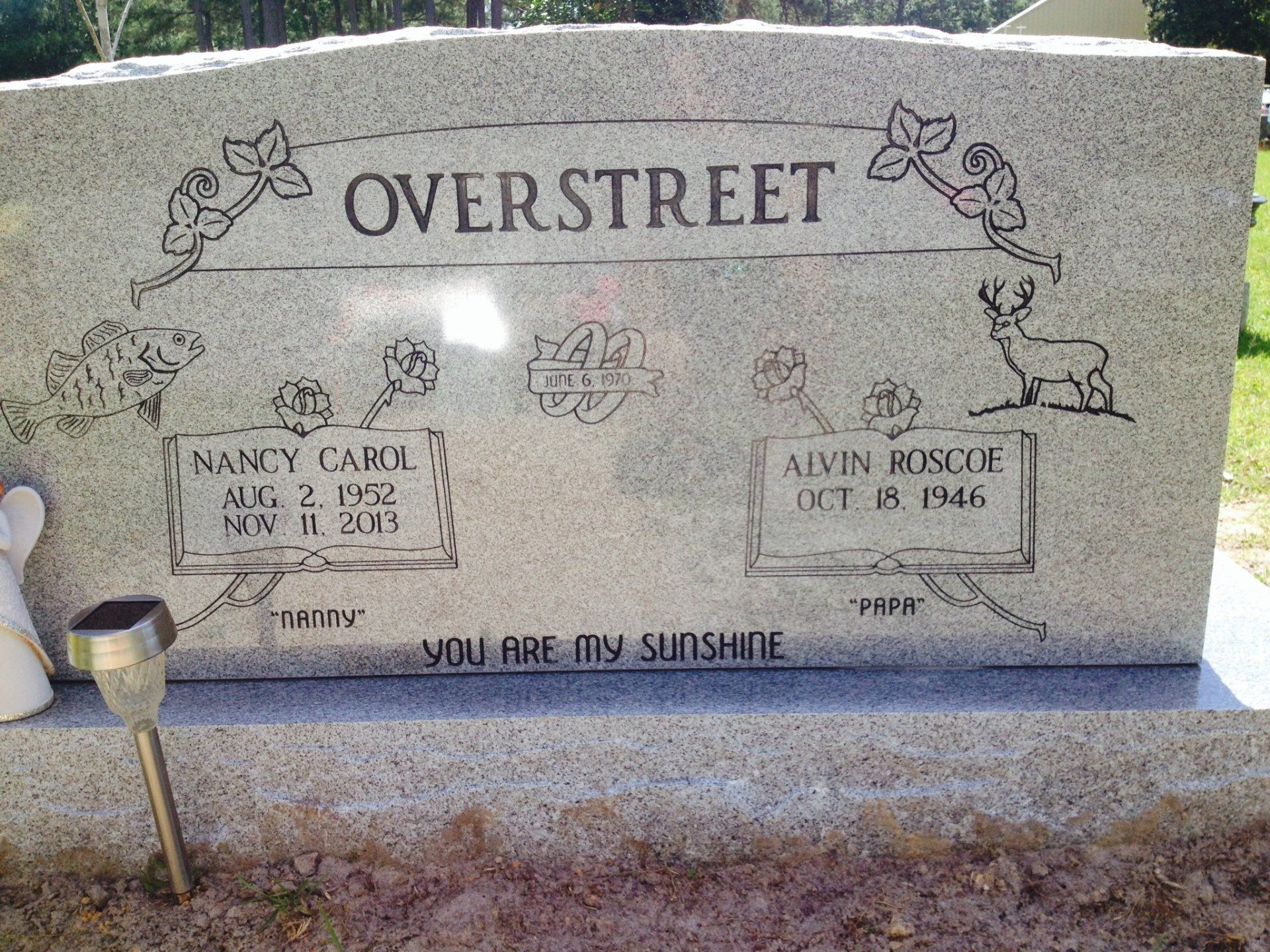 A gravestone with the name overstreet on it