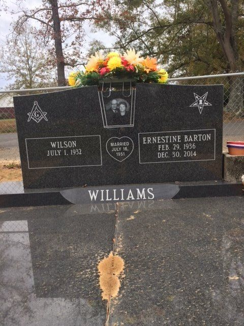 A gravestone for wilson and ernestine barton