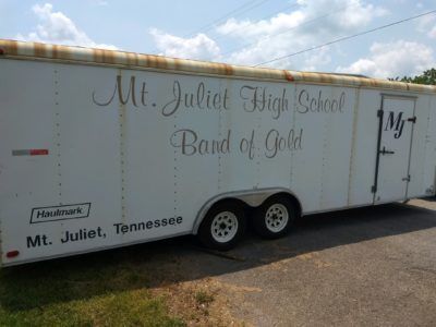 A white trailer for mt. juliet high school band of gold