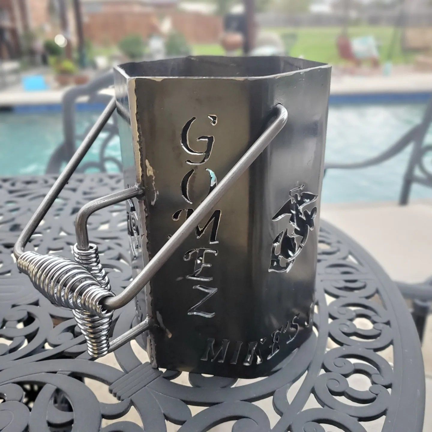 A metal container with the word gog on it