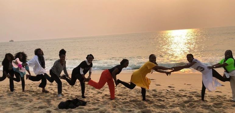 Young people having fun on a beach.