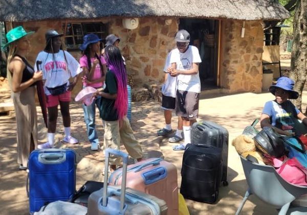 Children arriving for church camp.
