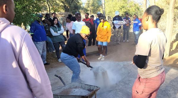 Breaking ground for a missions hall.