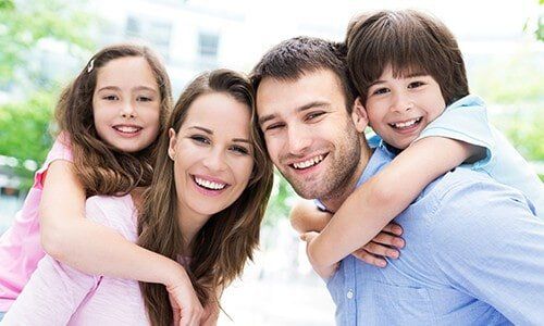 Family Smiling - Dentistry in Pleasant Hill, MO