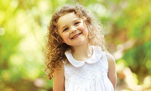 Child Smiling - Dentistry in Pleasant Hill, MO