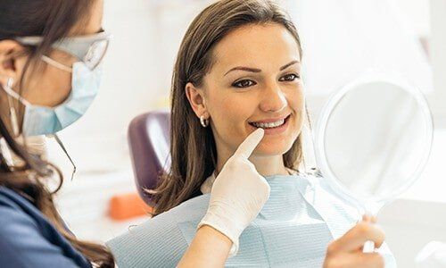 Dentist and Patient - TMJ treatment in Pleasant Hill, MO