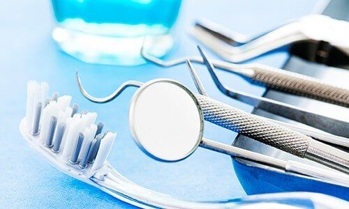 Dental Tools and Toothbrush - Cosmetic Dentistry in Pleasant Hill, MO