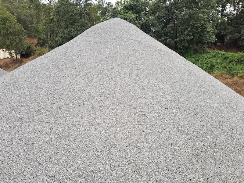 A Large Pile of Gravel Is Sitting in The Middle of A Field — Zappala Quarries in Gordonvale, QLD