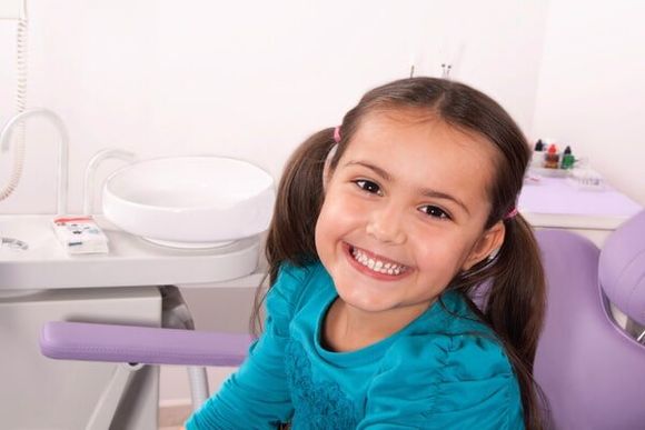 Child Smiling at Dentist Chair Lab - Dentist in Lake Charles, LA