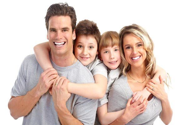 Family Smiling with Healthy Teeth and Gum - Dentist in Lake Charles, LA Family Smiling with Healthy Teeth and Gum - Dentist in Lake Charles, LA