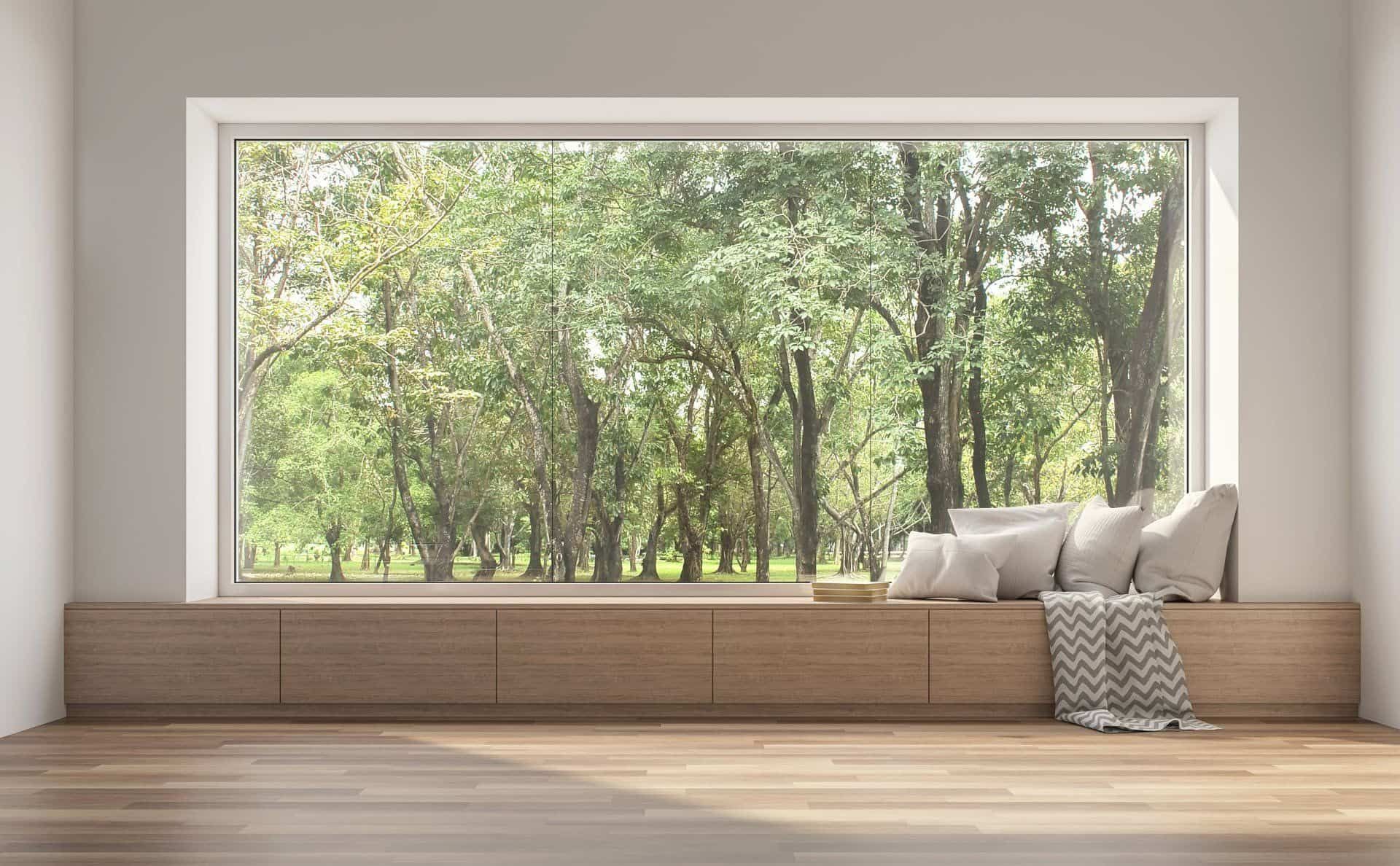 There is a Large Window With a View of a Forest — Halls Cabinets & Joinery in Harlaxton, QLD