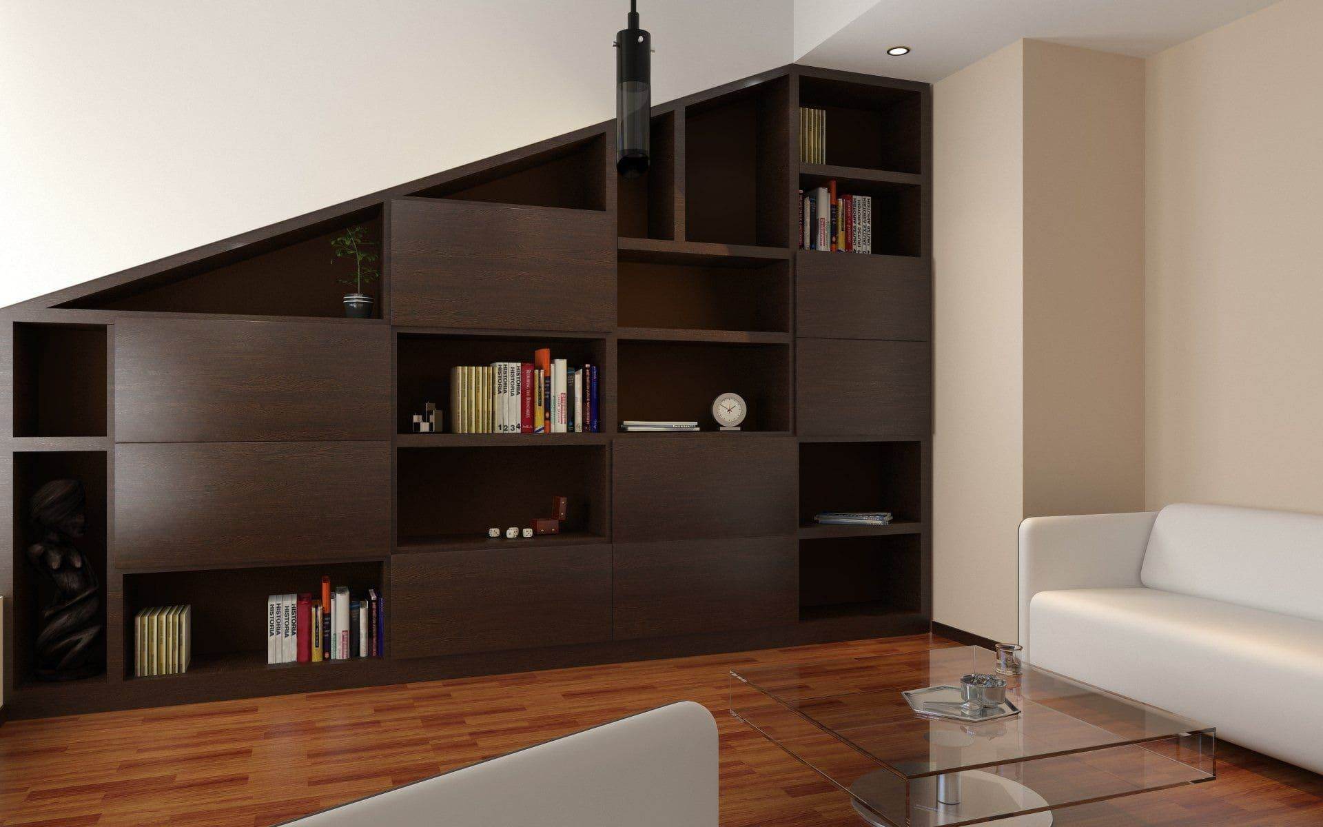 A Living Room With a Couch, Chair, facing Dark Brown Bookcase — Halls Cabinets & Joinery in Harlaxton, QLD